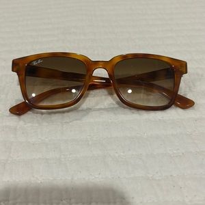 Light brown, ray ban sunglasses, good condition